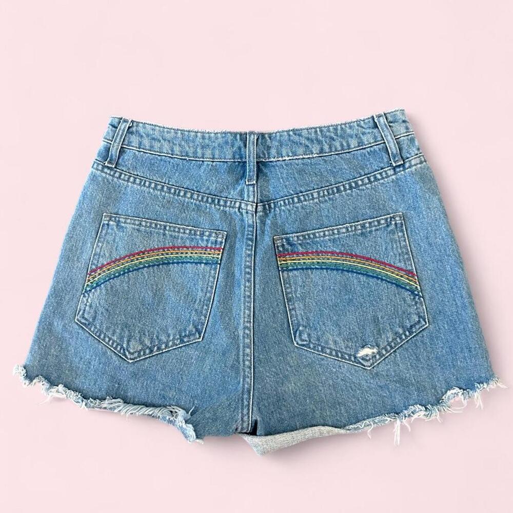 Show Me your Mumu Blue denim shorts with rainbow embroidery on back pockets
